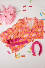Tennessee Tranquility Time Gameday Pajamas featuring vibrant colors, lounge pants, and headband, perfect for game day.